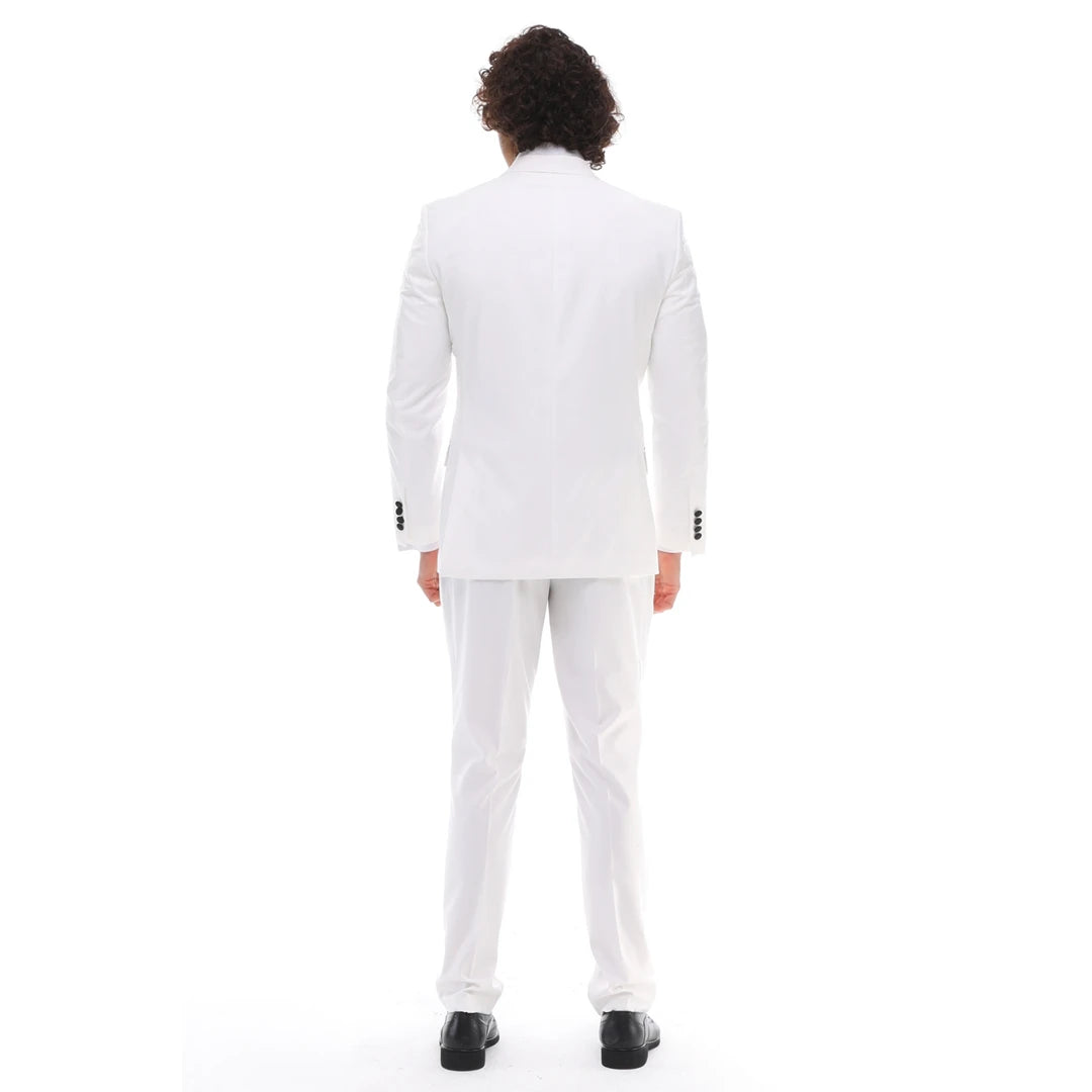 Traje cruzado para hombre: un esmoquin clásico para bodas con corbata negra y detalles en blanco y negro.
